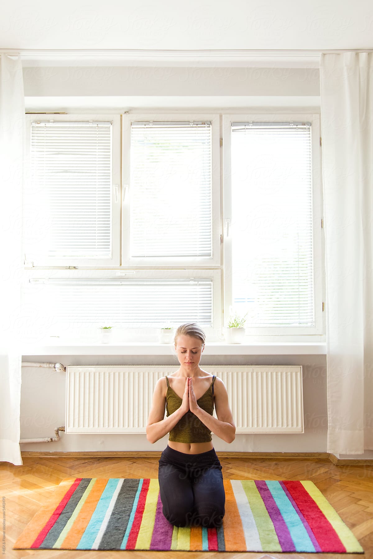 Woman Meditating At Home By Stocksy Contributor Danil Nevsky Stocksy