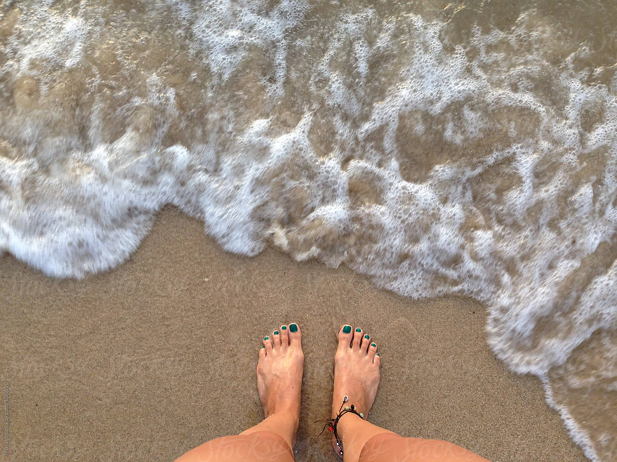 Close Up Of Female Legs In The Sand By Stocksy Contributor Mosuno Stocksy