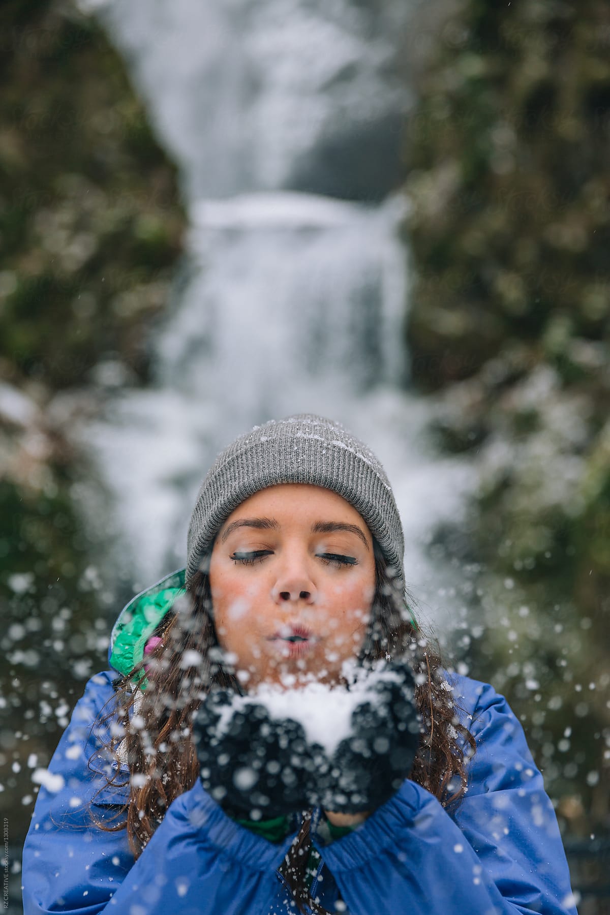 Woman Having Fun In Snow By Stocksy Contributor RZCREATIVE Stocksy