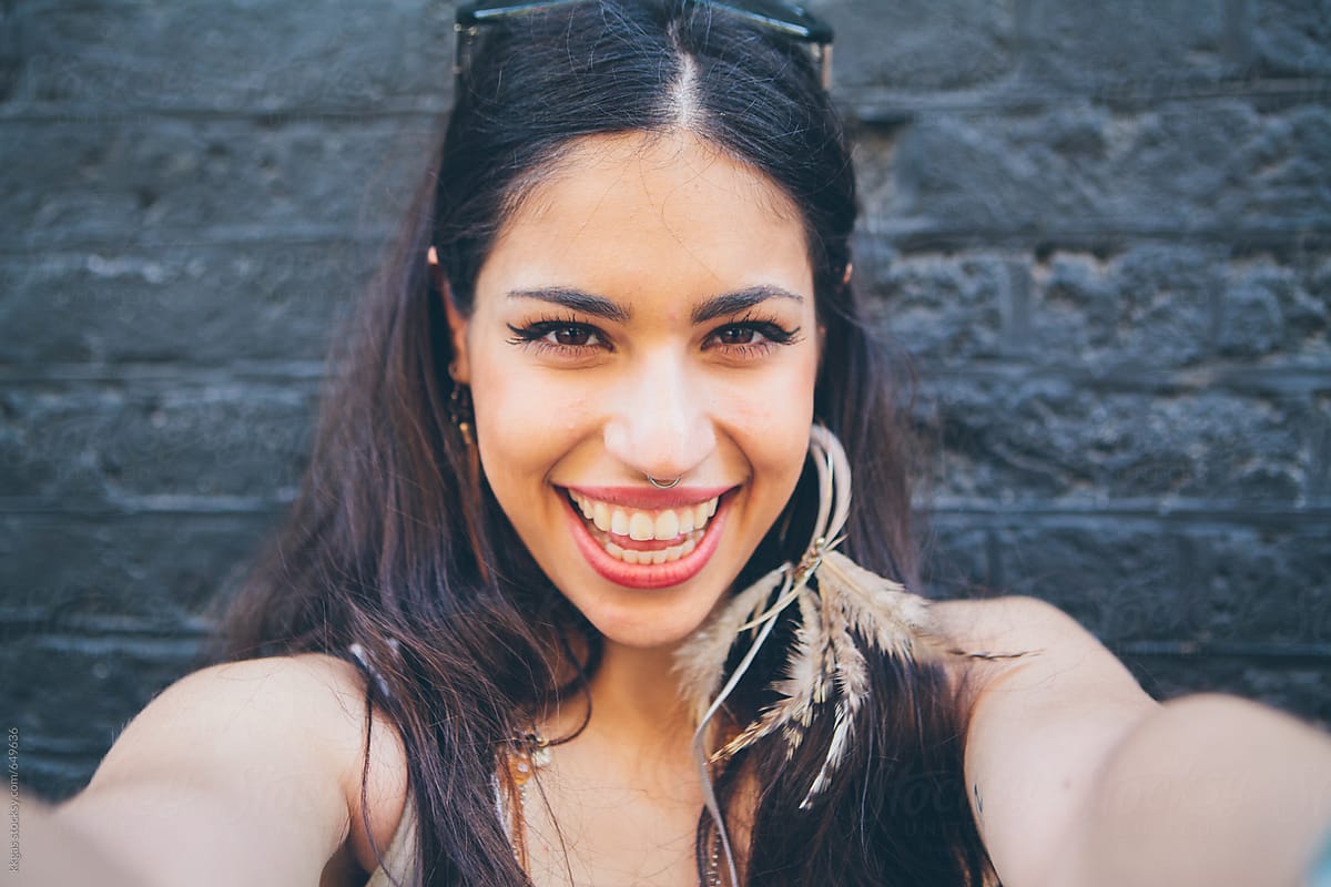 Beautiful Persian woman smiling selfie