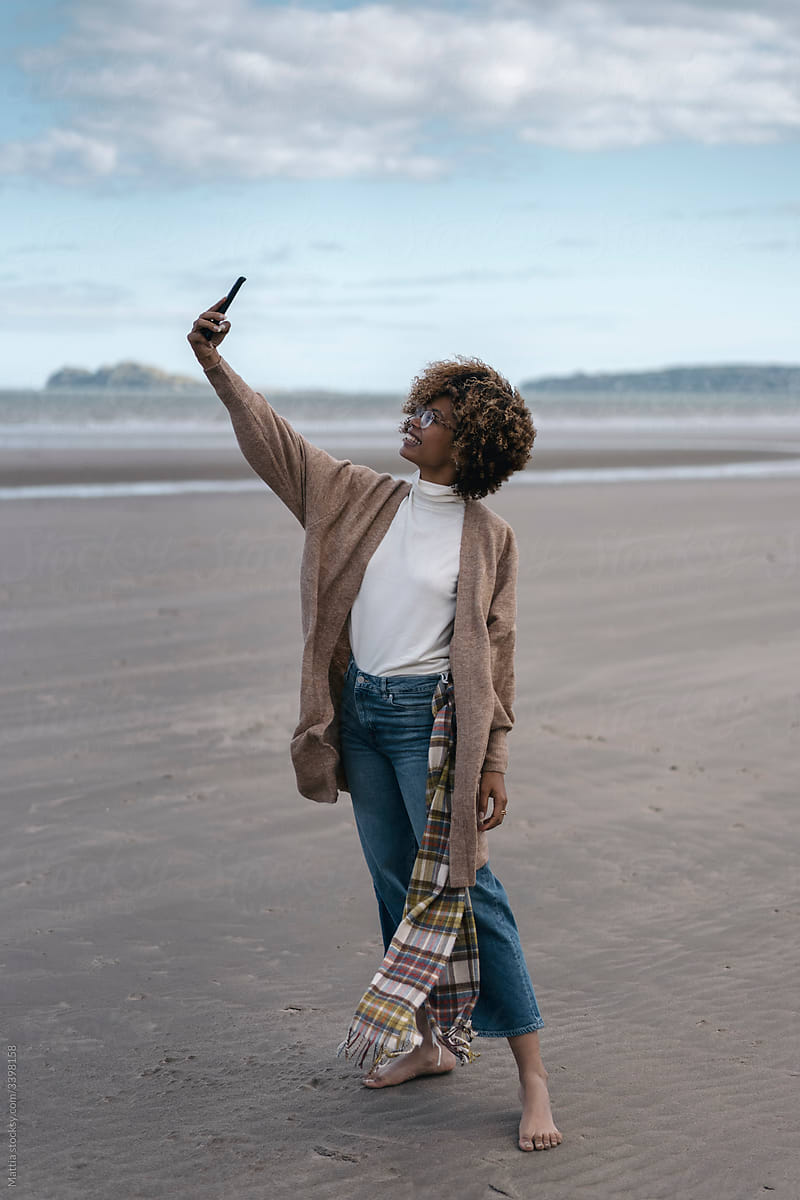 Black Woman Taking a Selfie Outdoors