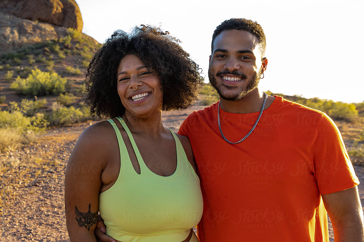 Portrait of Plus Size Young Black Couple Hiking together