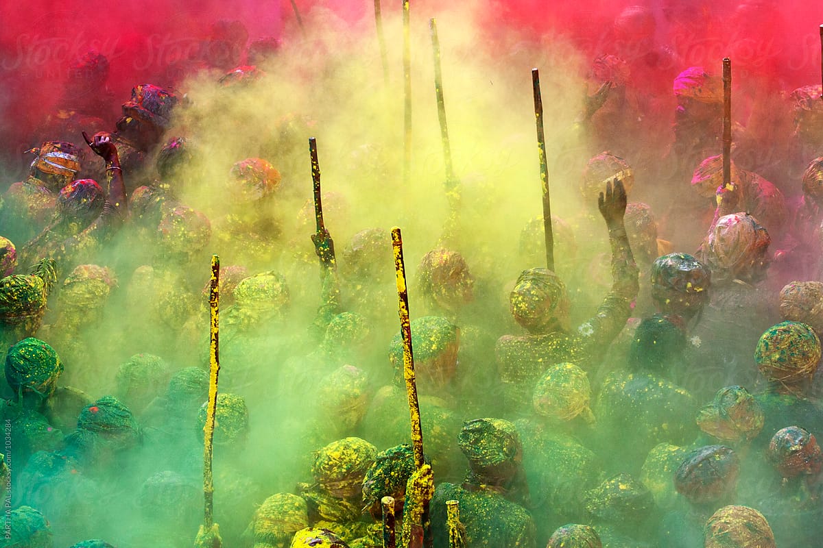 People Gather And Multicolour Powder Spreader In Air By Stocksy Contributor Dream Lover 6358