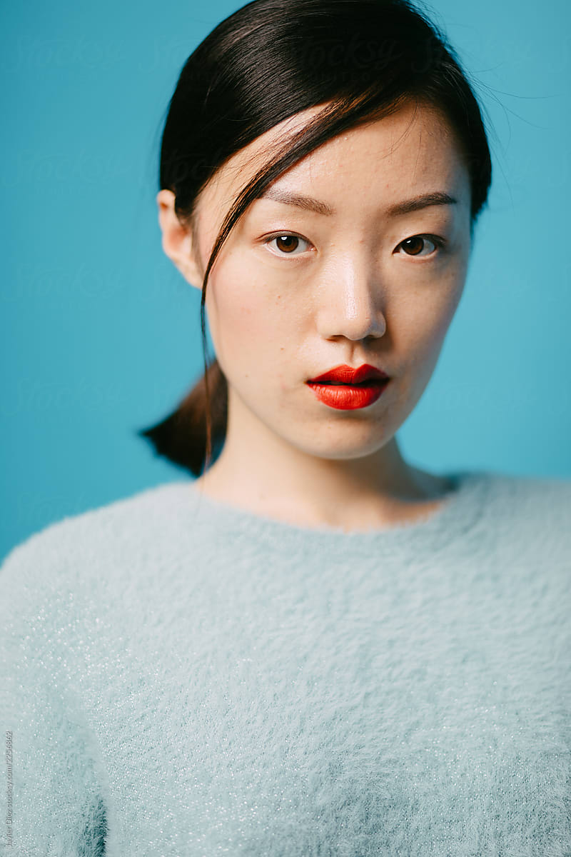 Portrait of Asian model with red lips