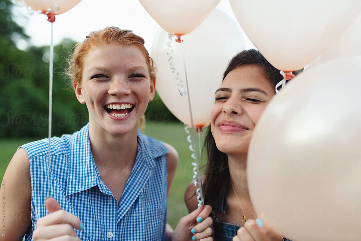 Two Best Friends Outside Playing With Balloons By Stocksy Contributor Chelsea Victoria Stocksy 