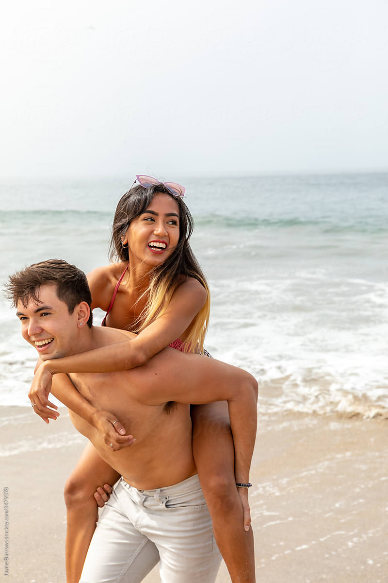 Couple Enjoys A Beach Day