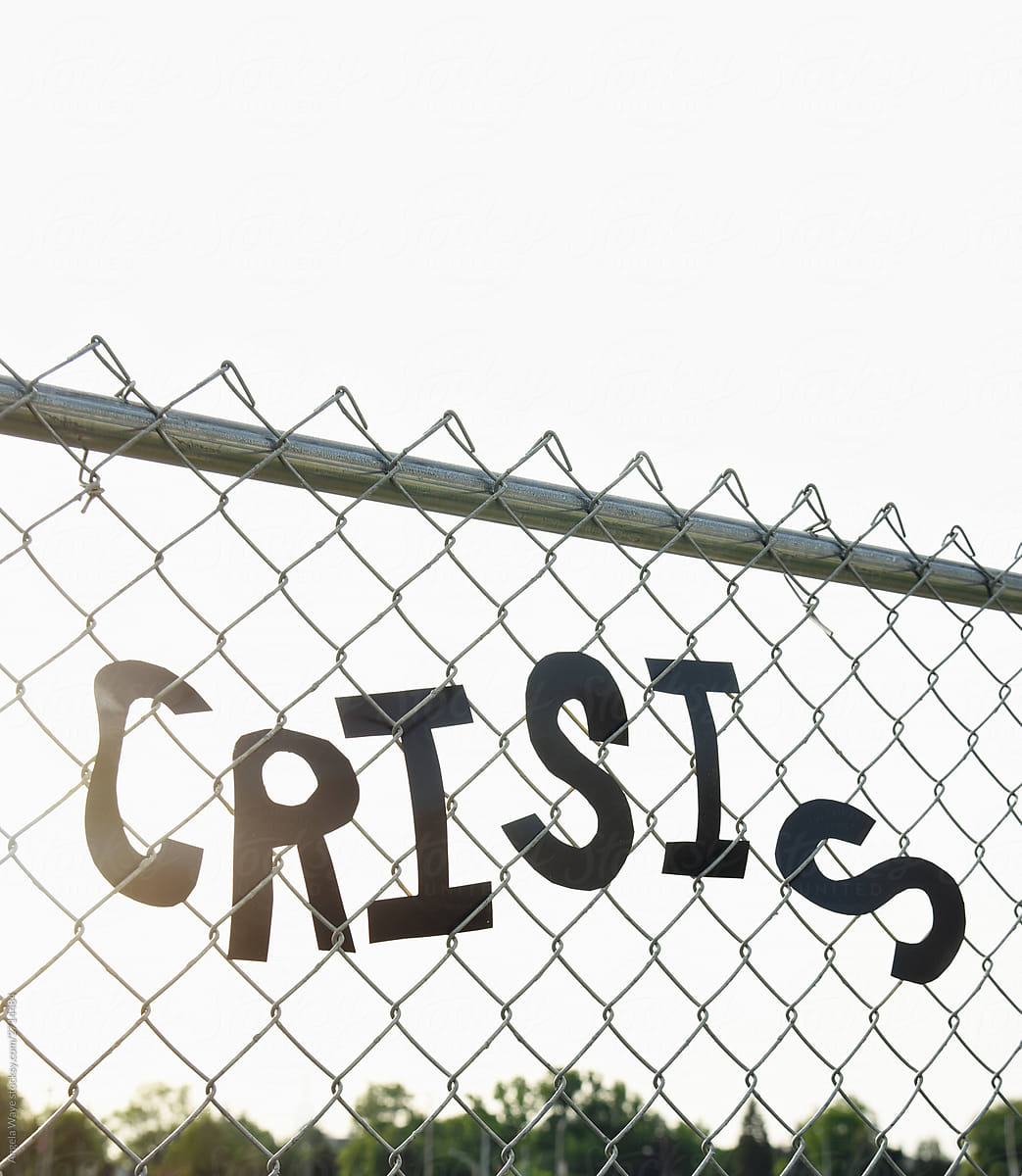 Crisis Words on Fence Border