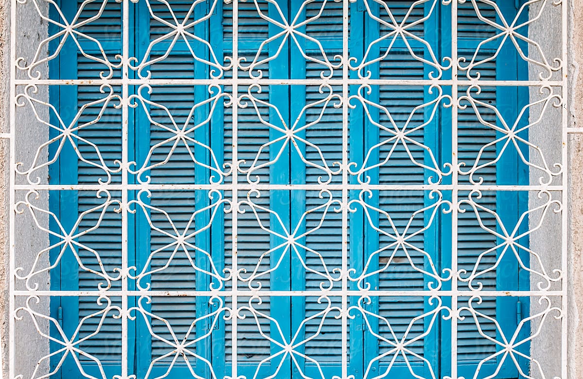 traditional blue Arab window with white grid