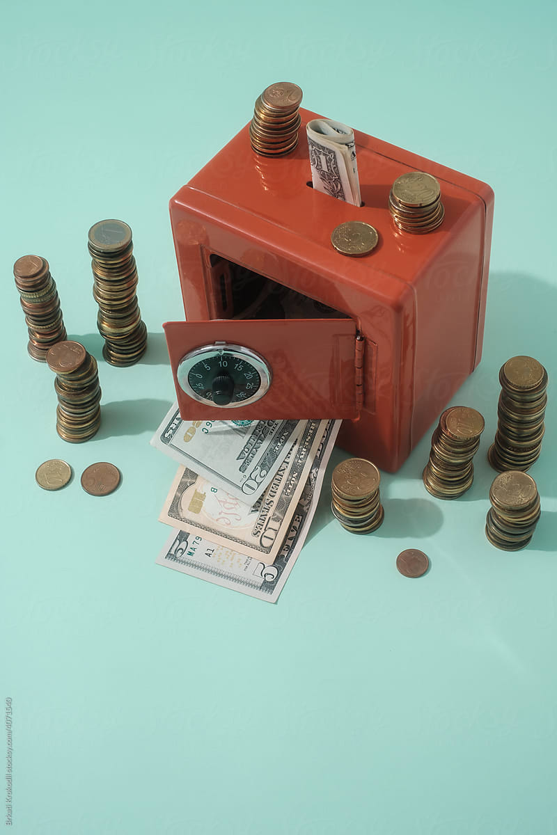 Money Safe Box With Dollar Bills And Euro Coins