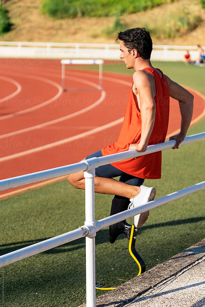 Portrait of disabled man athlete with leg prosthesis