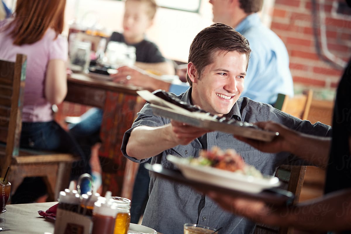 Barbeque: Hungry Man Takes Food From Waiter