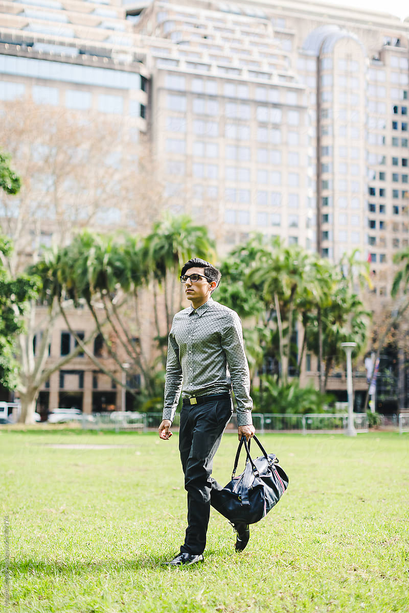 A Businessman goes to work by walking. Sydney, Australia.
