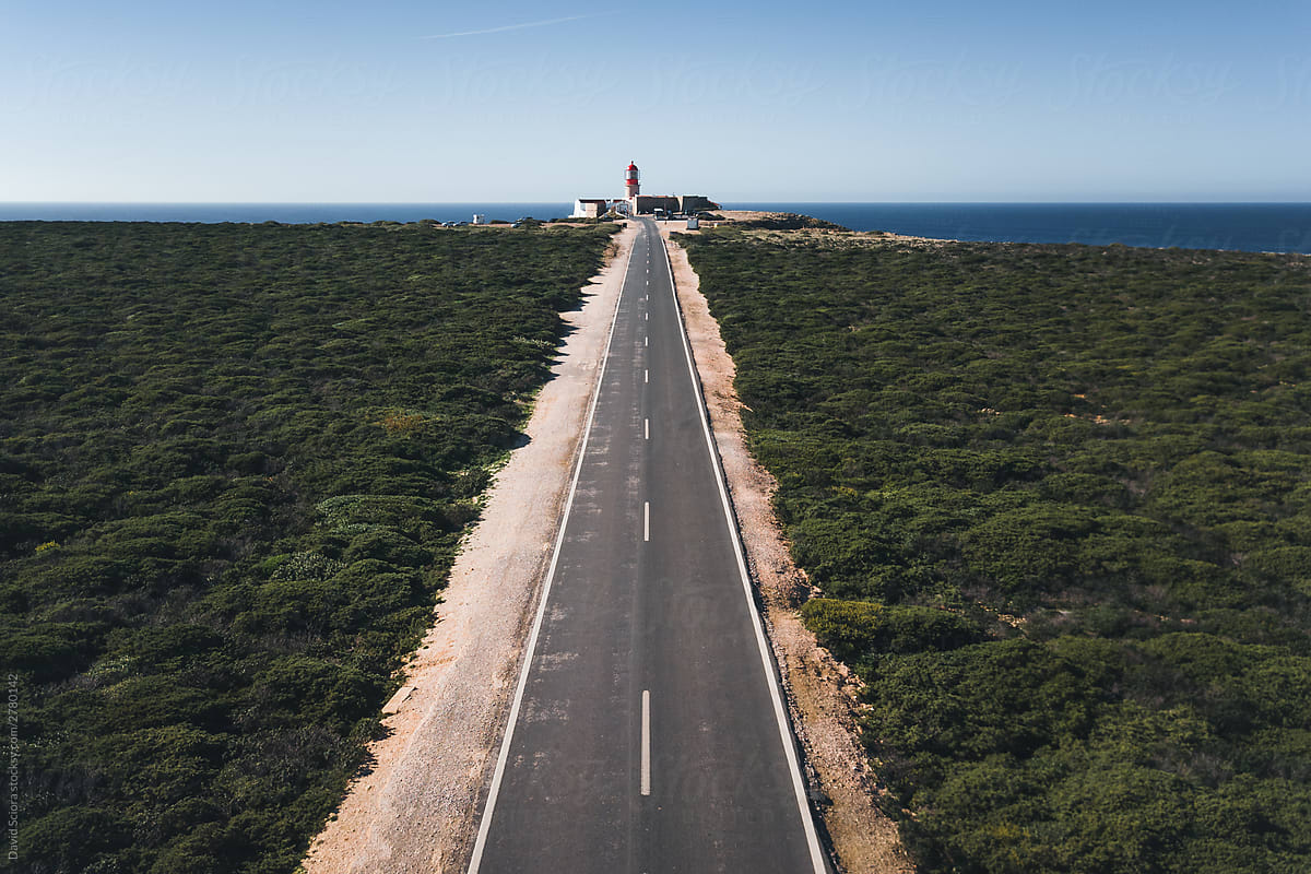 Aerial view of the straight road leading to the lighthouse