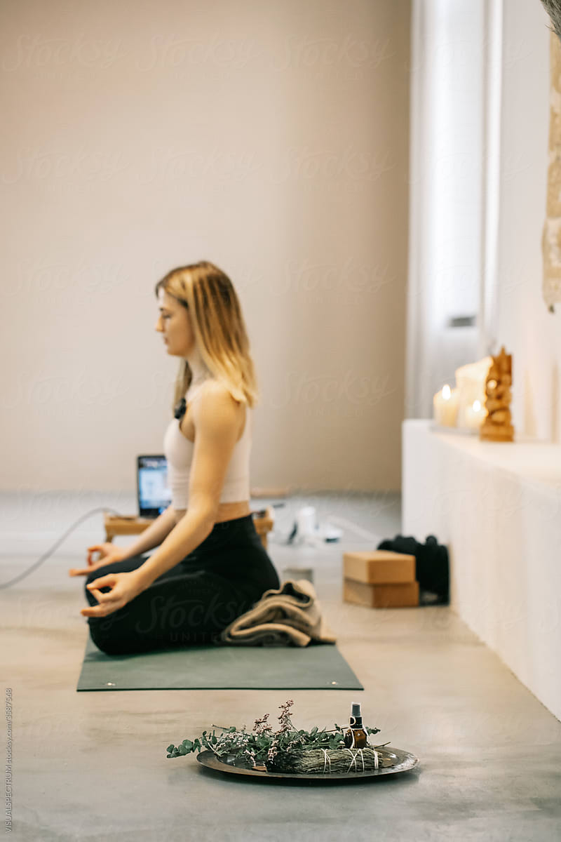 Sage Smudge With Blurred Yoga Teacher