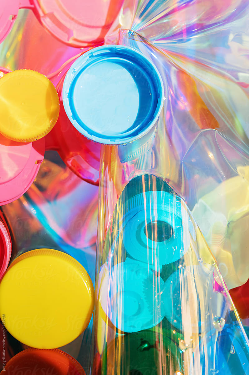 Close-up of Colorful Plastic Bottlecaps in Water