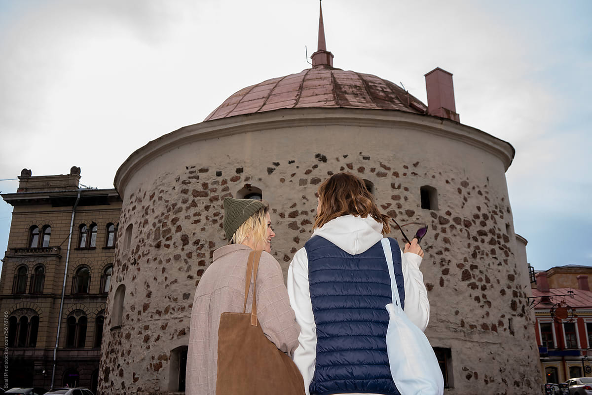 women looking to the old medieval tower