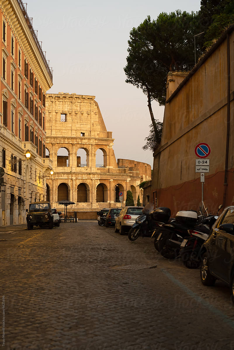 Roma, colosseum from a side street at sunset