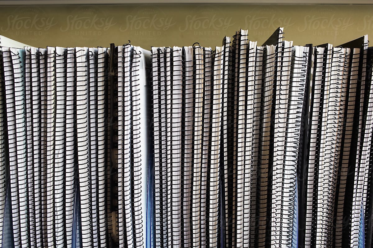 Notebooks on a shelf of an archive or library
