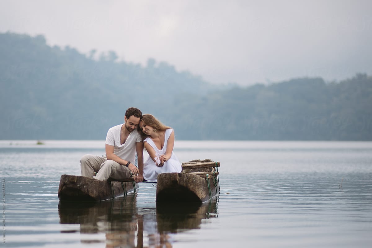 View Romantic Couple In Boat On Lake By Stocksy Contributor