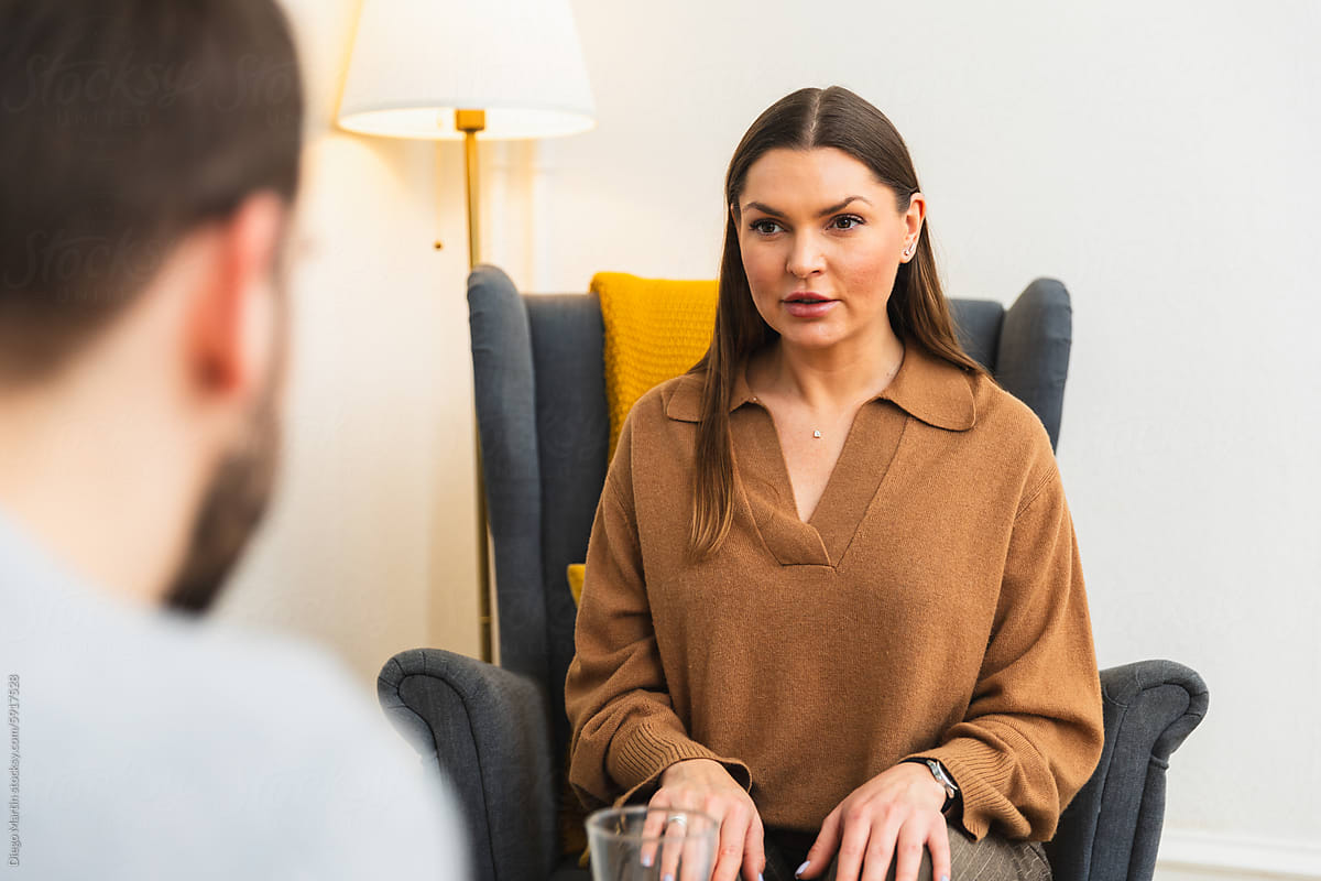 Psychologist during a therapy session with client
