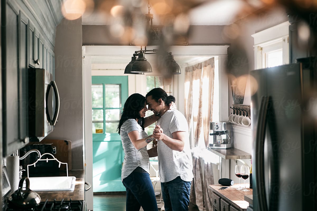 Tunes: Couple Dancing In Kitchen To Music