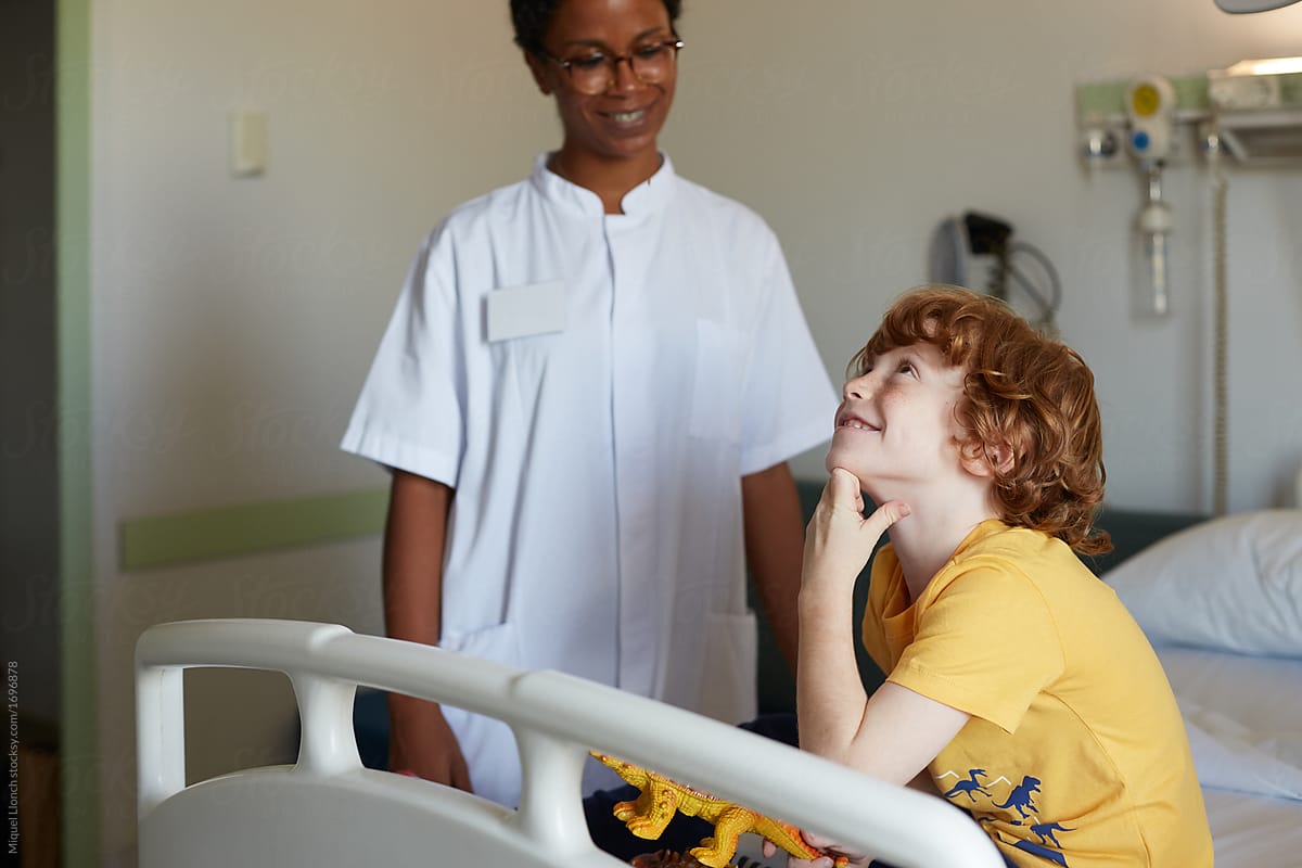 Child patient and doctor in a relax moment in the hospital room