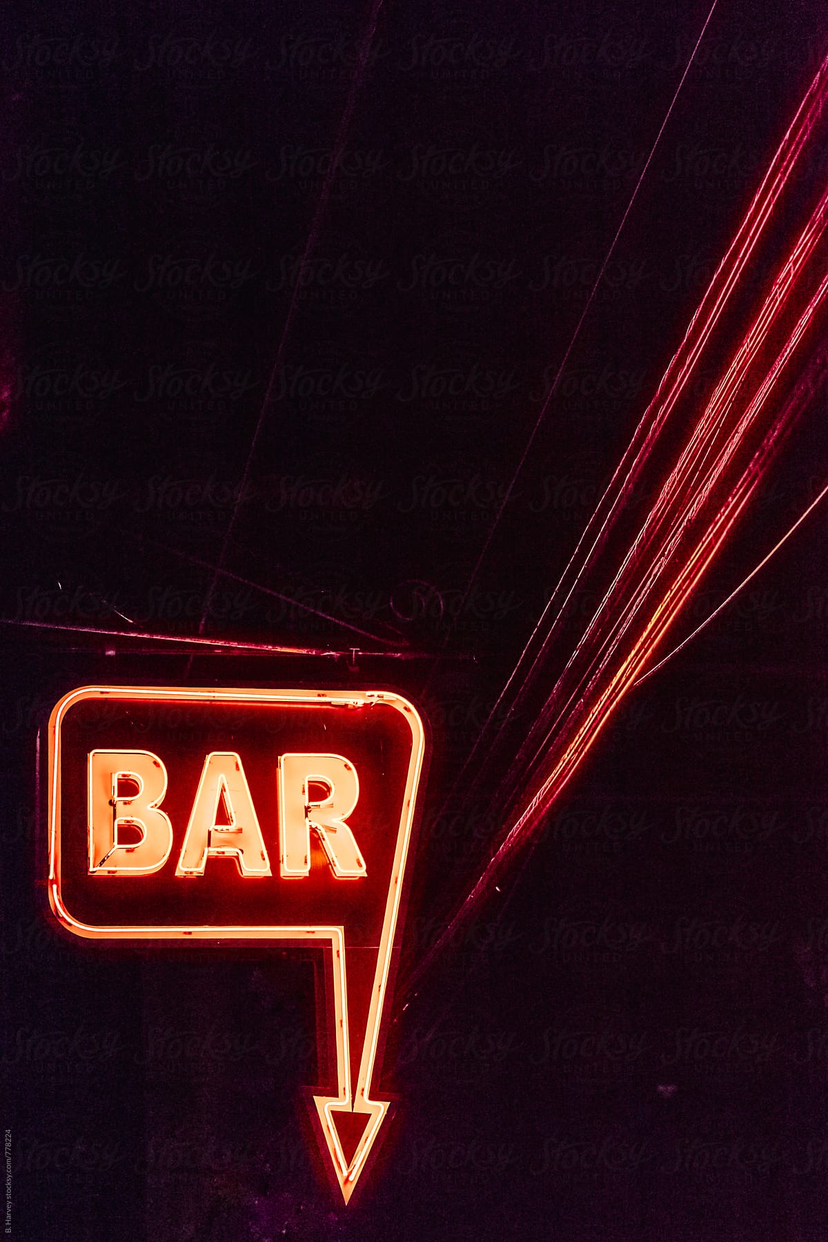Minimalist BAR sign at night