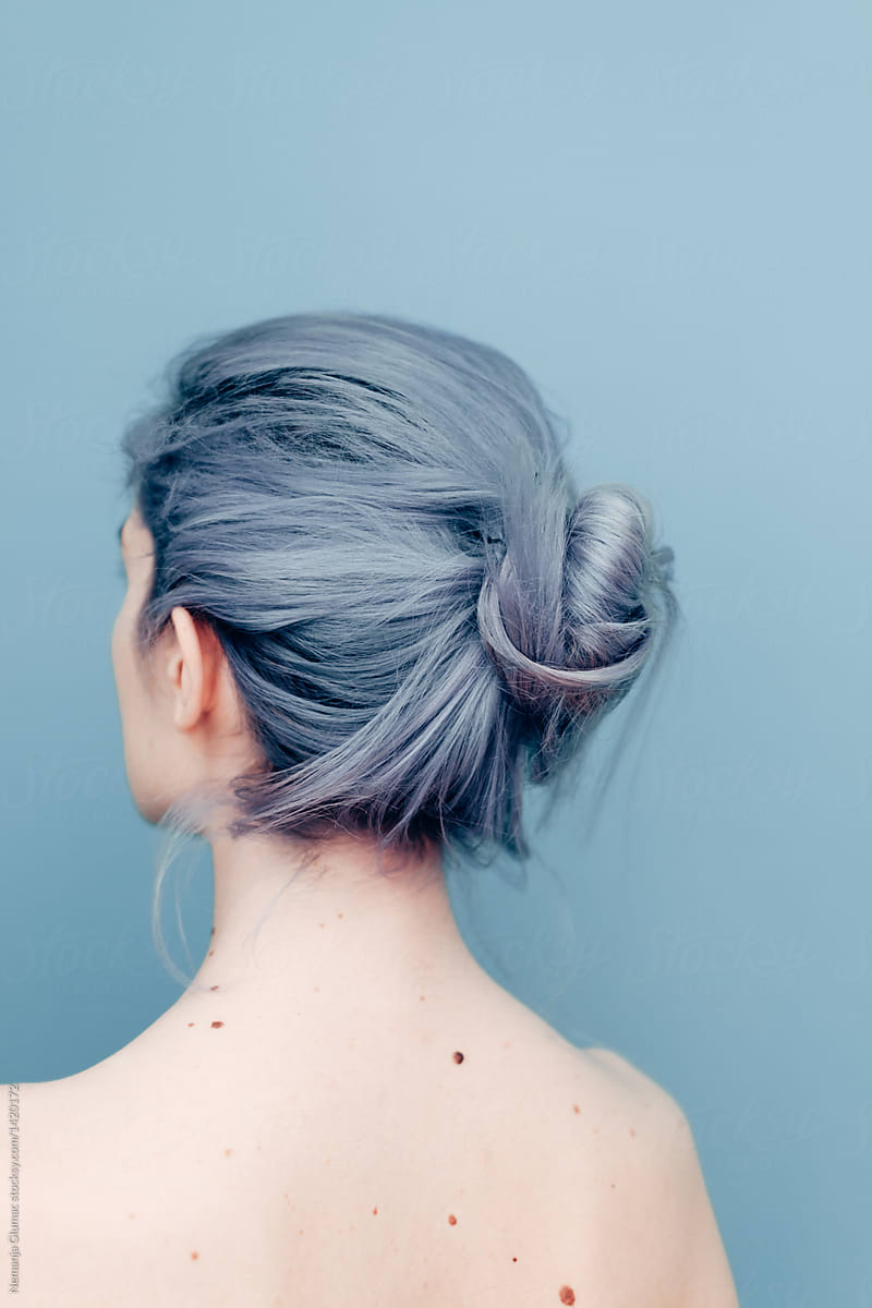 Delicate Pale Young Woman With Blue Hair