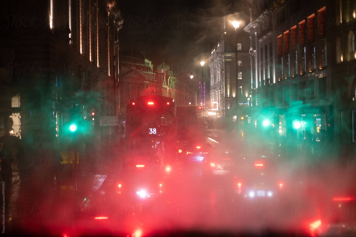 Streets of London with traffic at night