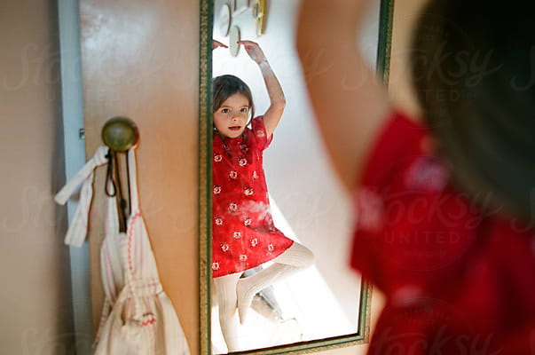 Little Girl Pushes Shopping Cart Down Sidewalk In Underwear by Stocksy  Contributor Maria Manco - Stocksy