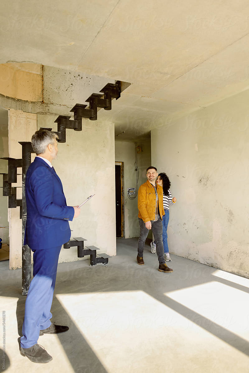 Broker Greeting Clients Visit Renovate Building Property