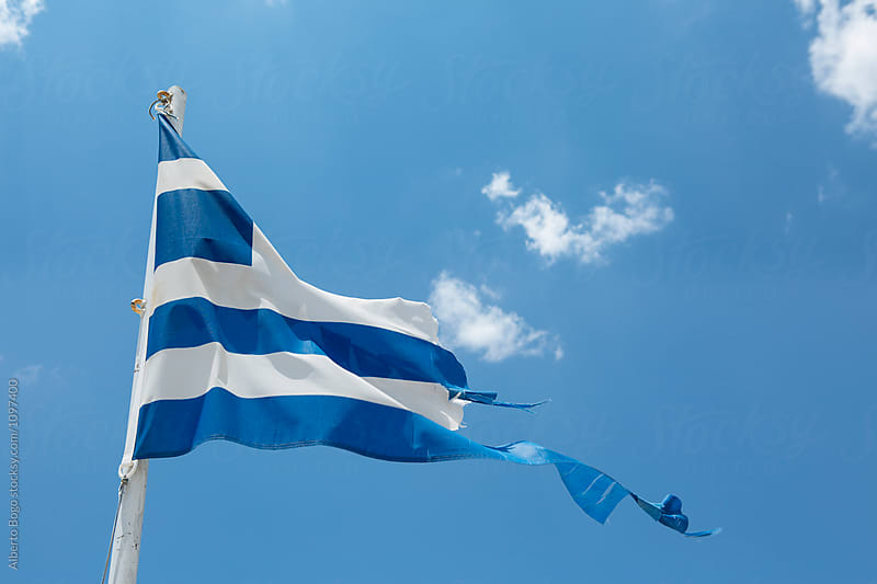 Greek torn flag fluttering in the wind