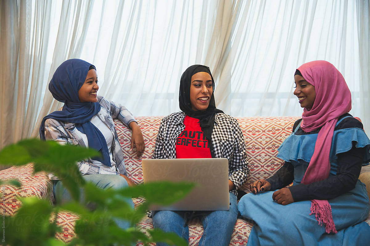 Young Muslim Girls Looking At Computer