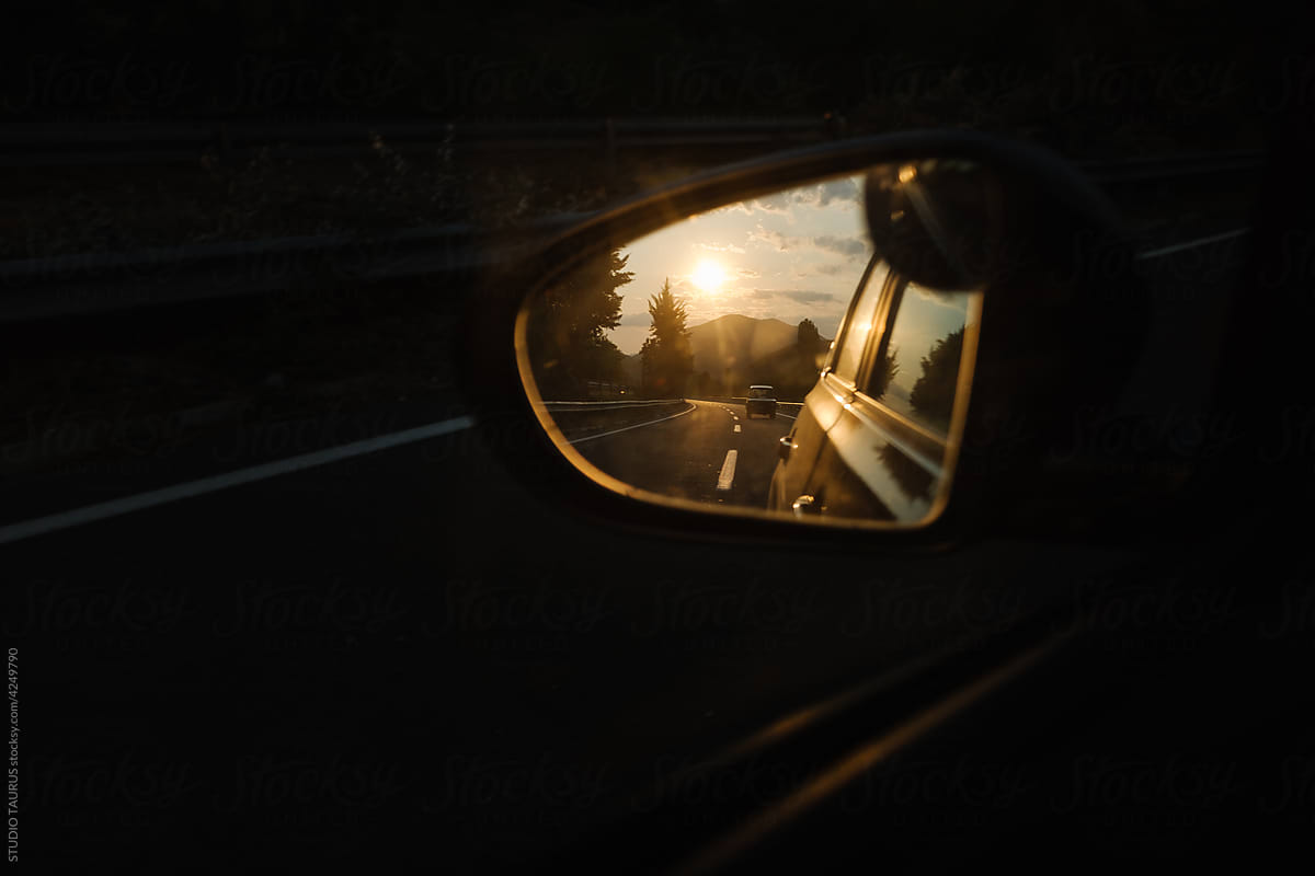 Vehicle mirror reflection on the road