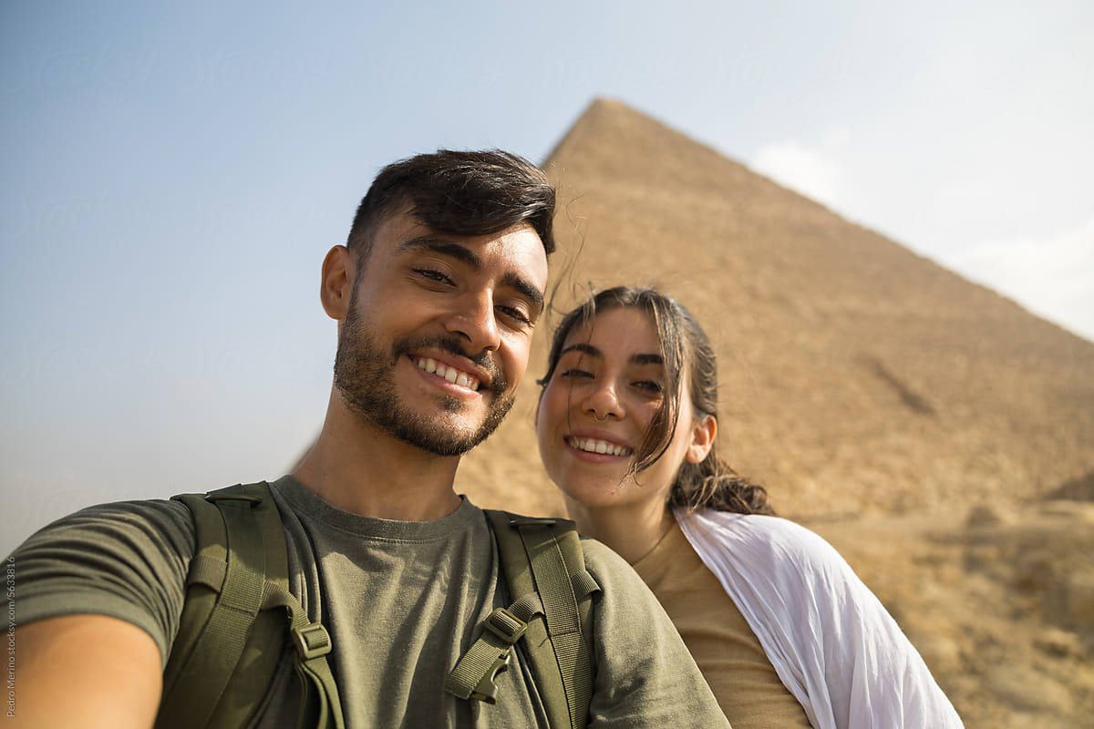 Selfie of a couple at the pyramids of Egypt.