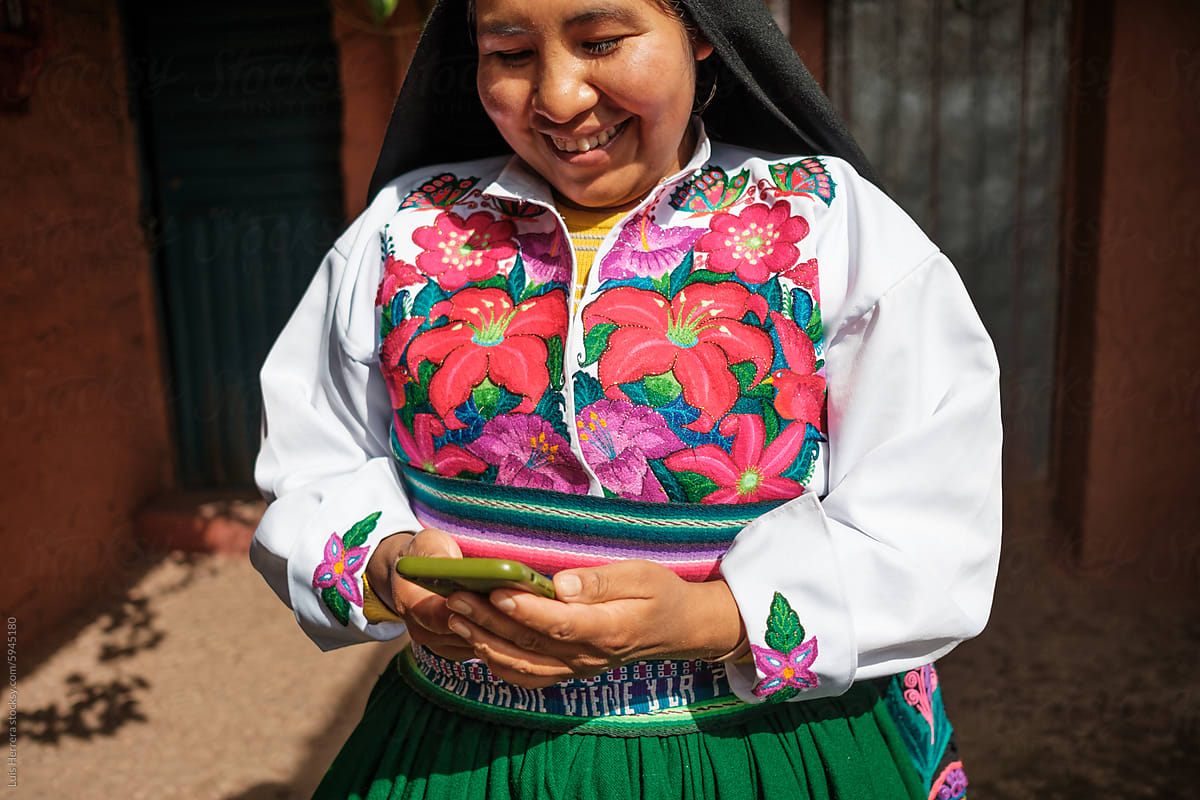 peruvian woman Using her phone