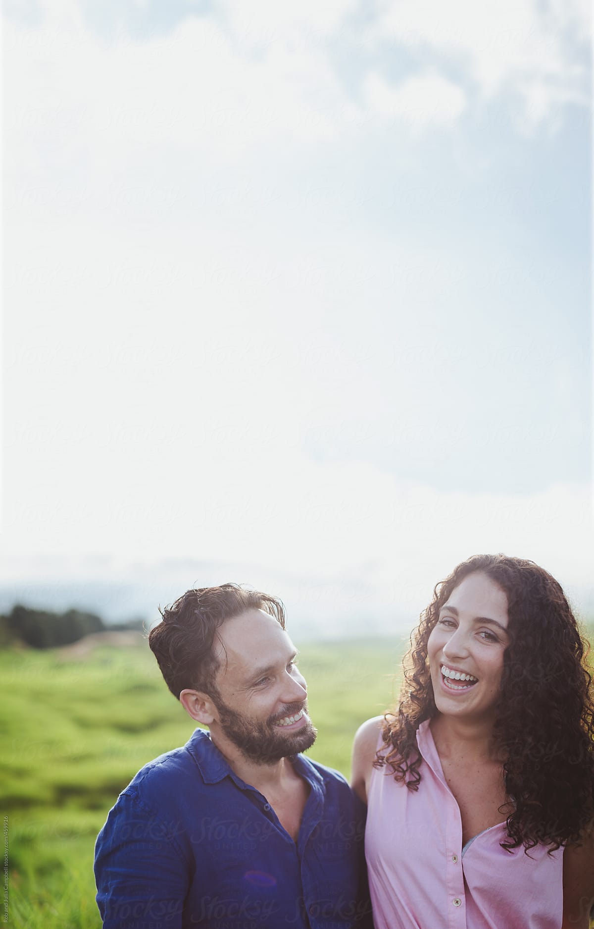 Young Couple Together Outside Laughing And Hugging In Nature By Stocksy Contributor Rob And 
