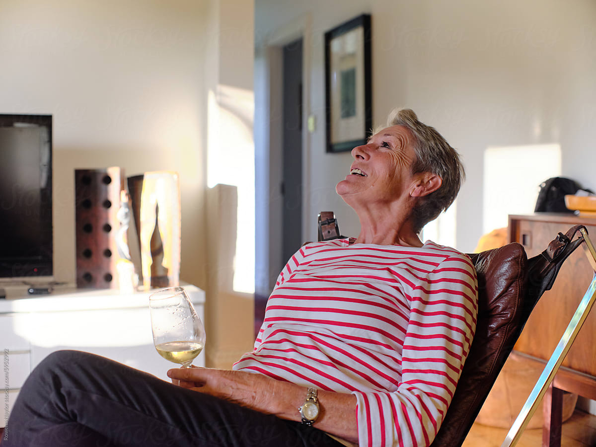 Portrait of older lesbian relaxing at home