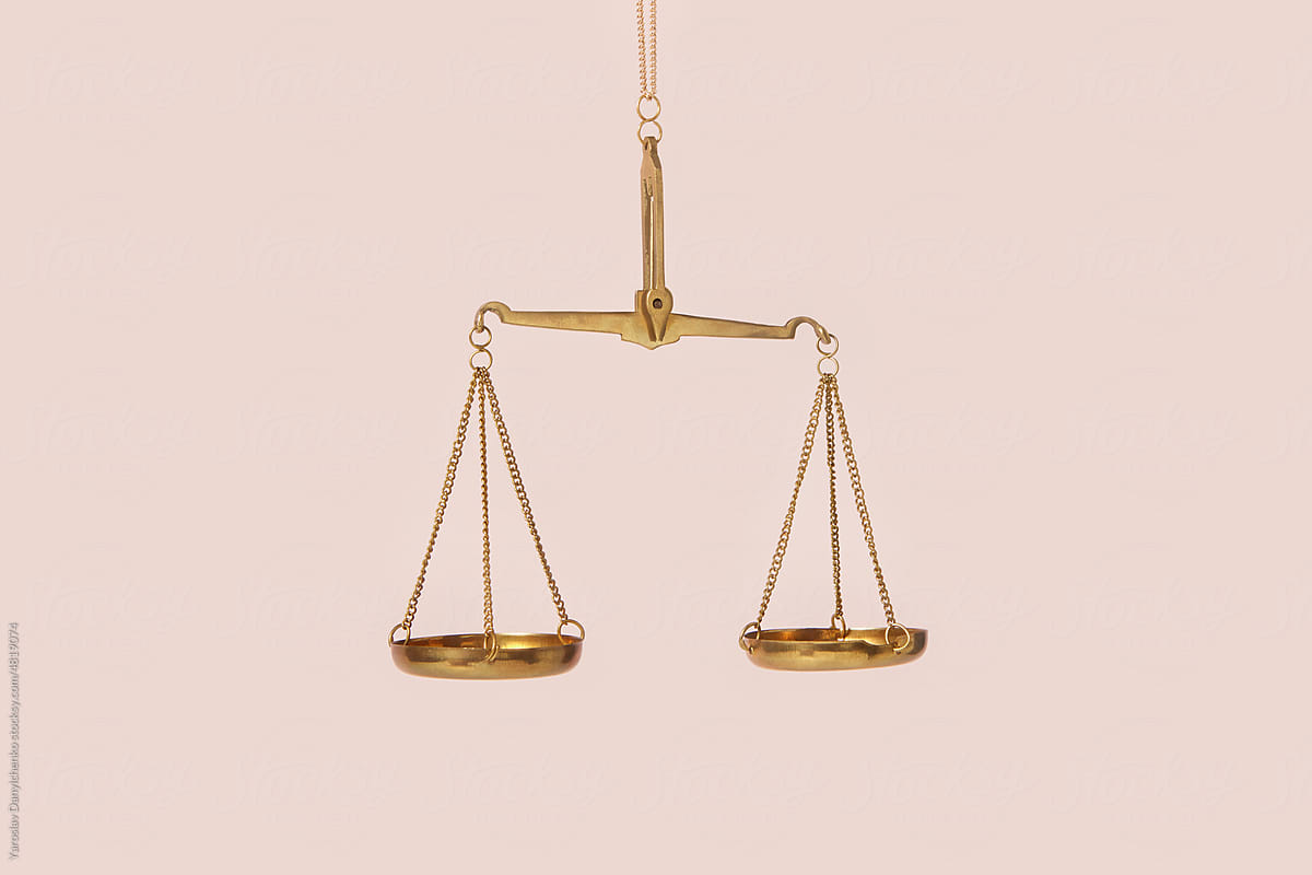 Empty golden vintage scales of justice.