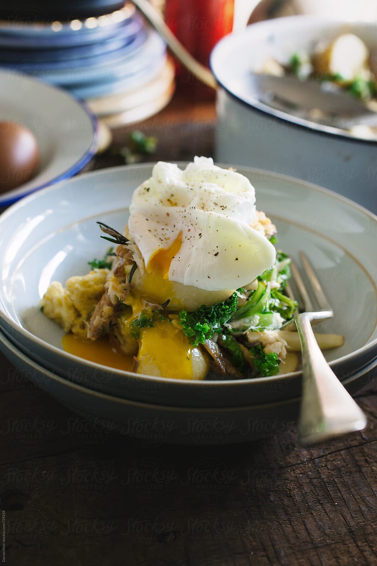 Smoked mackerel and kale salad with a poached egg.