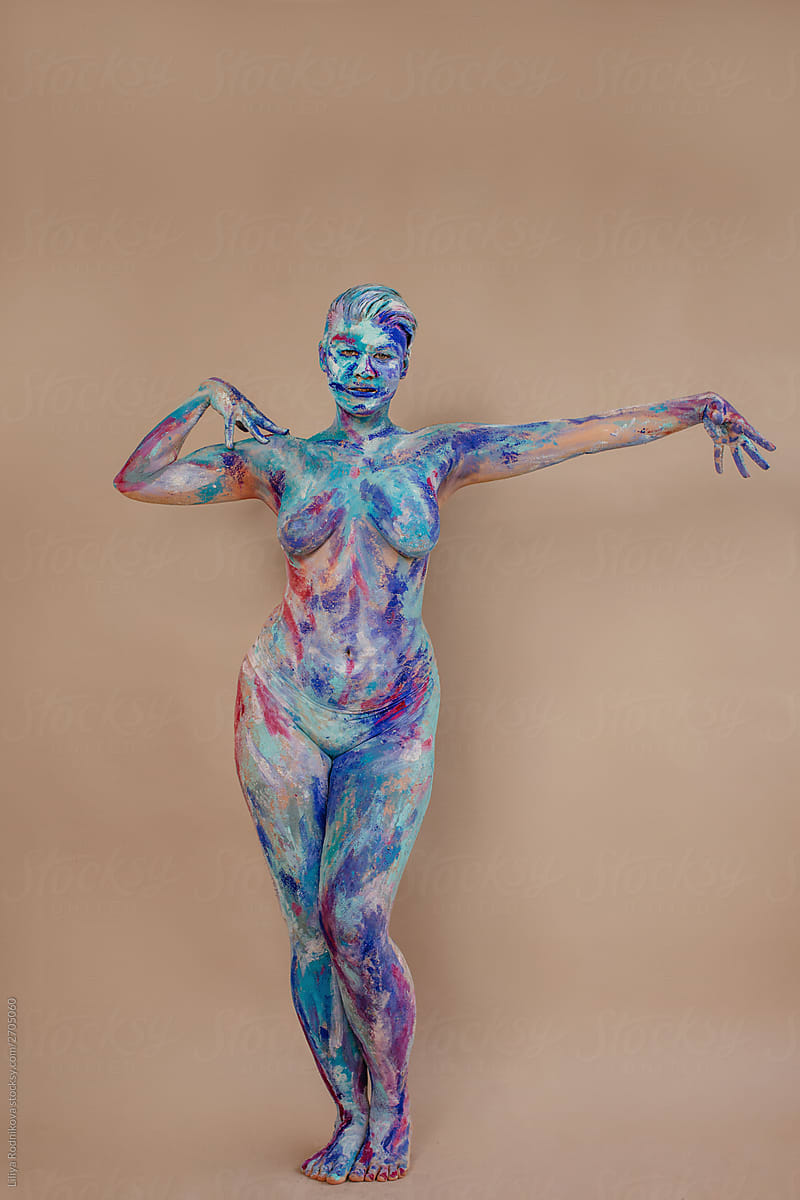 Naked female with colorful painted body