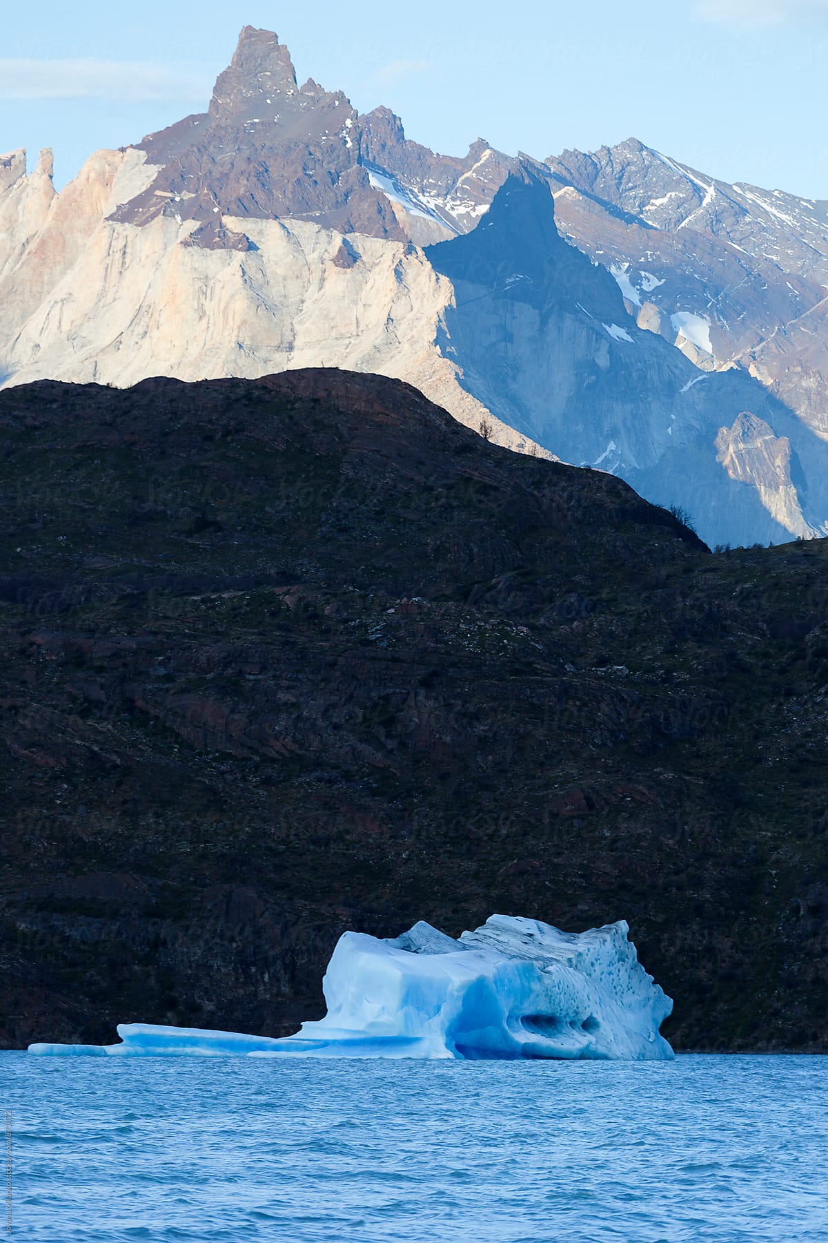 Melting Ice Glacier Floating in Water Background