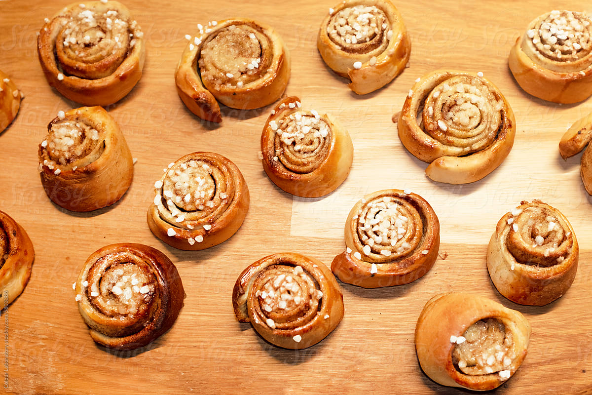 Freshly baked delicious sweet pastry cinnamon buns with direct flash