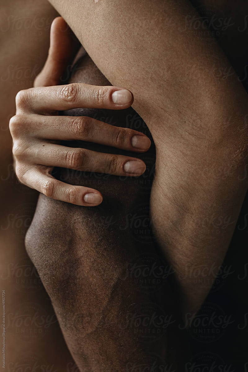 White woman's hand holding black man's hand, Multiethnic Love Couple