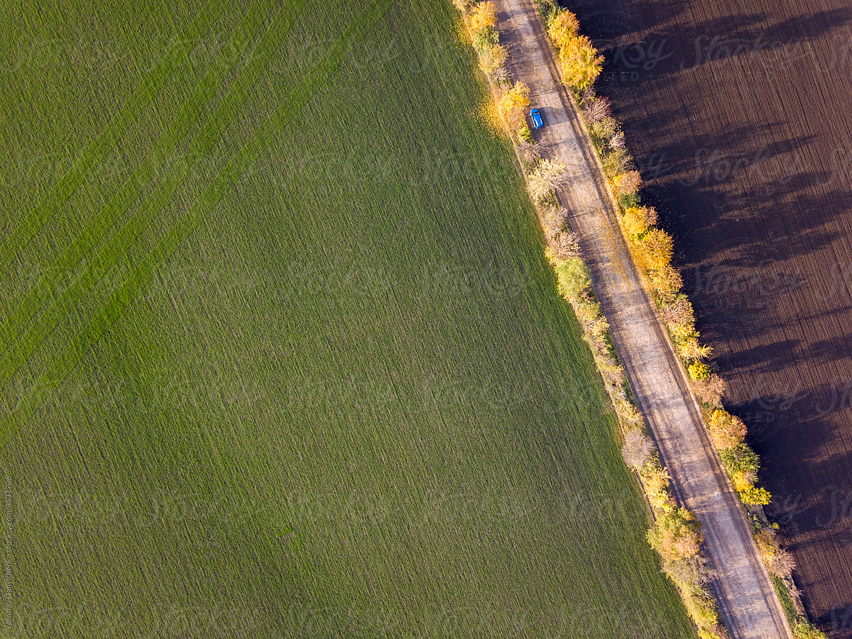 Areal view of agricultural fields after harvesting.