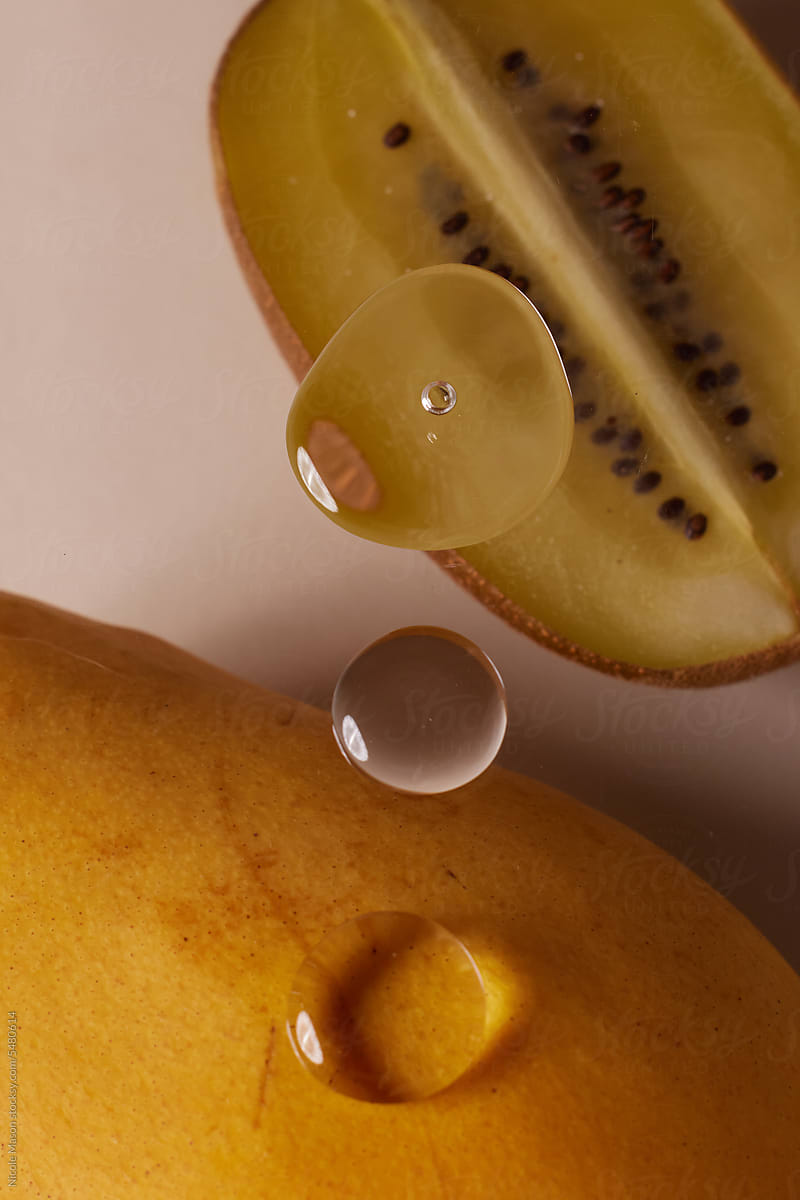 Kiwi Slice and mango with Water Droplets