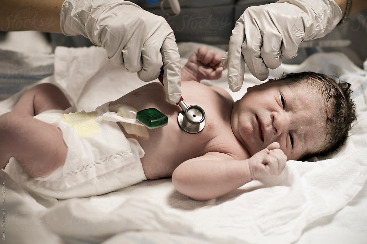 Newborn Baby getting APGAR examination