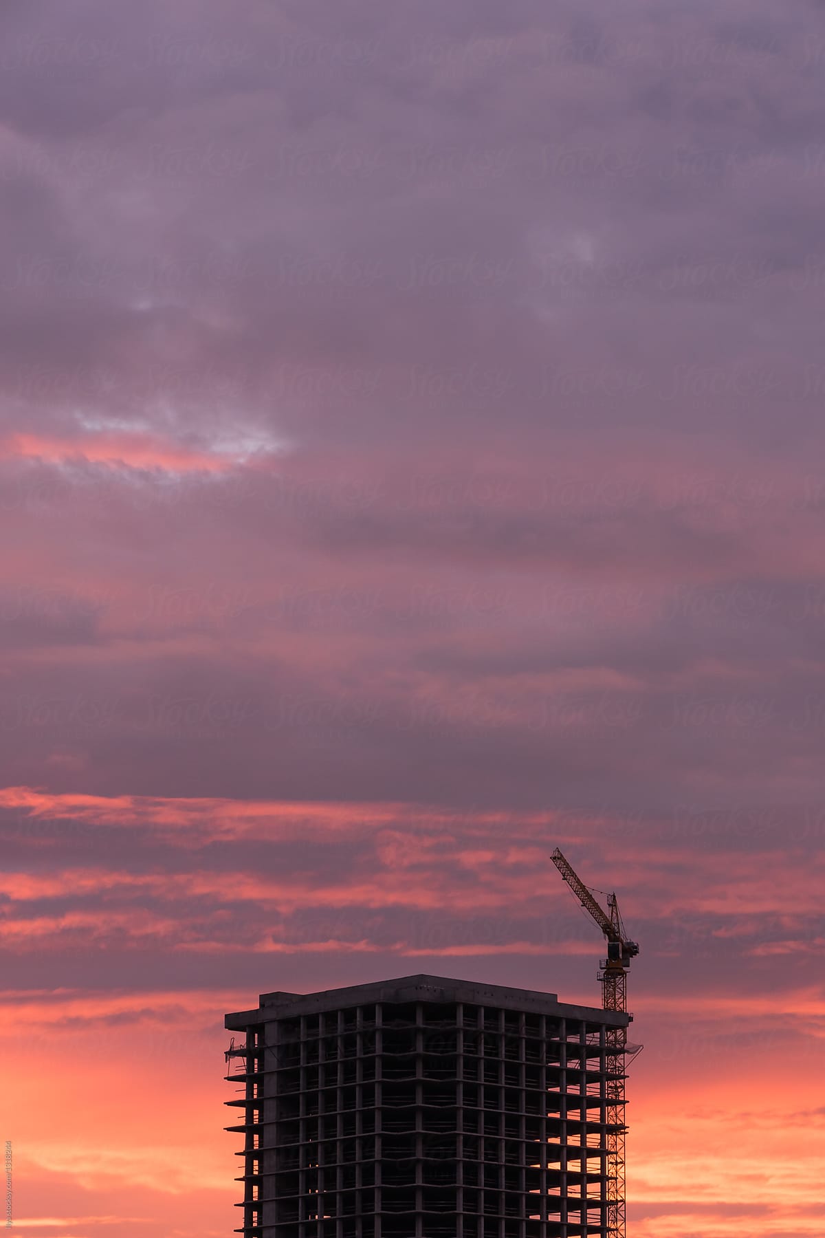 Construction building site crane sunset