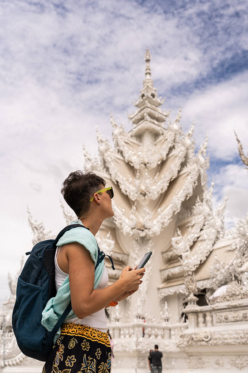 Tourist woman at Wat Rong Khun temple.