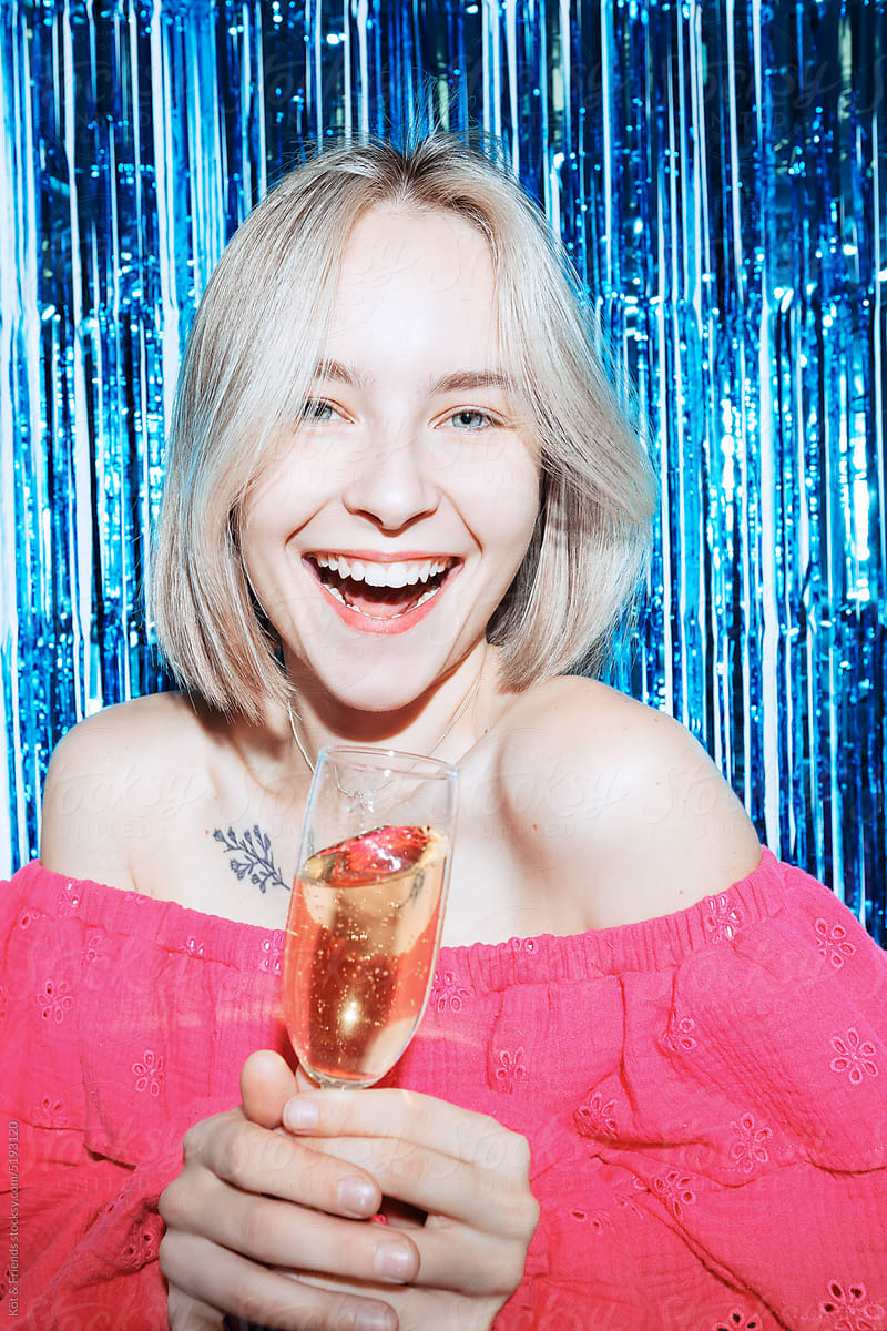 Young Woman With Champagne Glass Having Fun